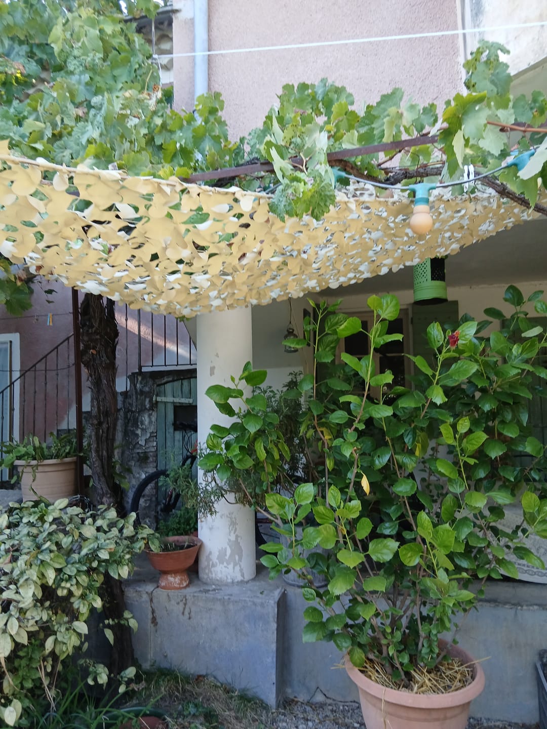 Customer photo review of Filet de camouflage triangulaire sable