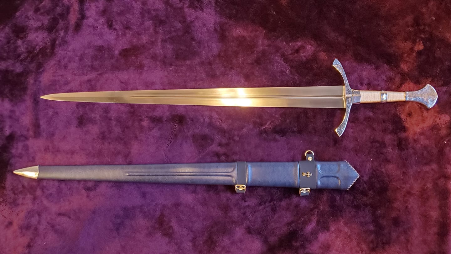 Customer photo review of The Moonlit Hand and a Half Sword (golden color handle version)
