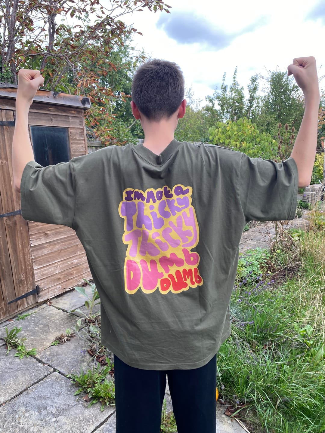 Customer photo review of Thicky Thicky Dumb Dumb, Cody Dahler | Oversized Unisex Tee in Khaki