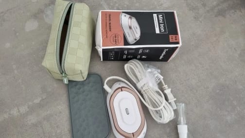 Customer photo review of THE MINI TRAVEL IRON PACK LIGHT. LOOK SHARP.