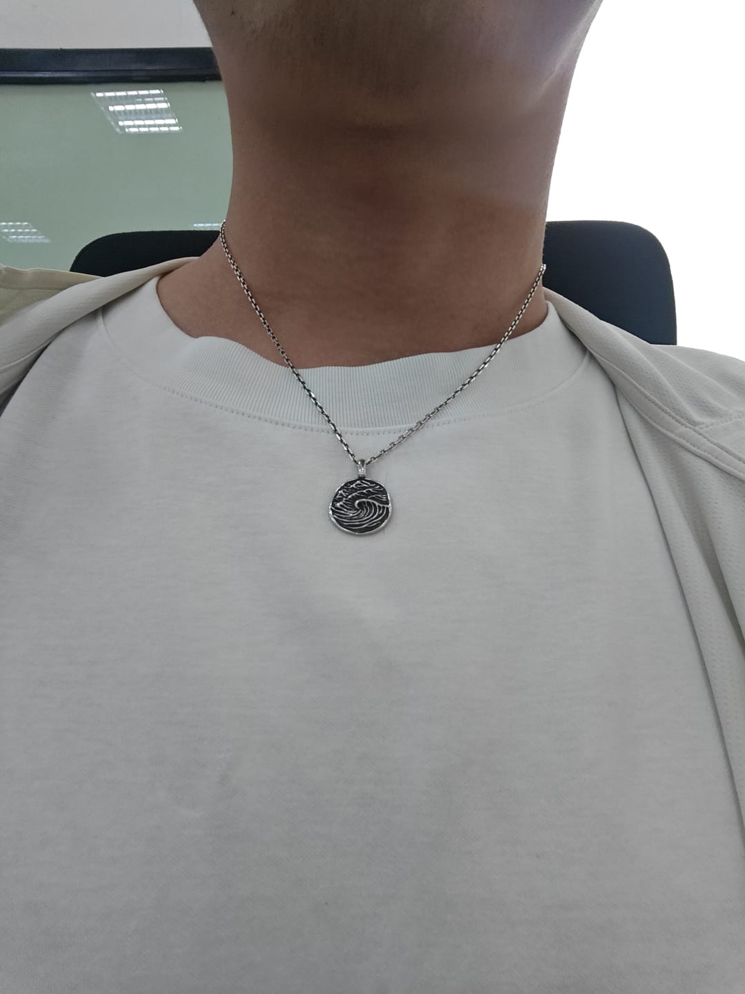 Customer photo review of Jeffreys Bay Wave Necklace