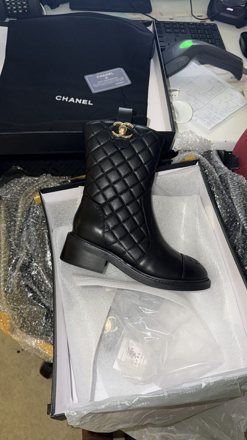 Customer photo review of CC 25S Round-Toe Zippered Ankle Boots in Black Cowhide and Embroidered Latticework 442503