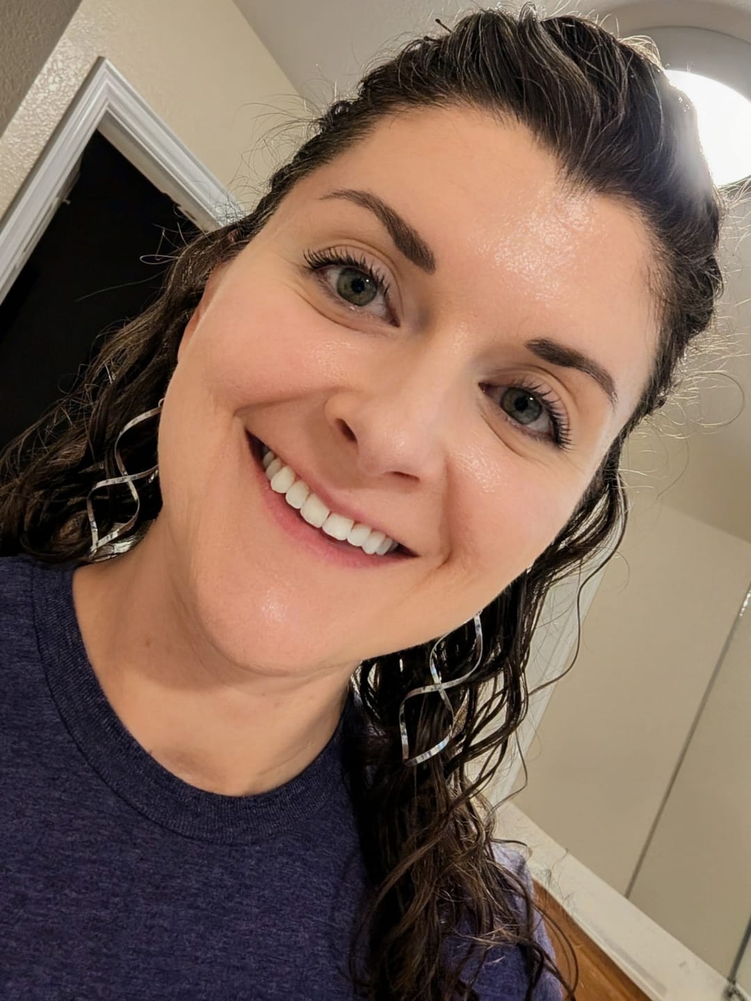 Customer photo review of Infinity Spiral Dangles Hypoallergenic Earrings for Sensitive Ears with Plastic Posts