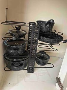 Customer photo review of GuleHome Siyah 8 Katlı Ayarlanabilir Tencere Tava Düzenleyici