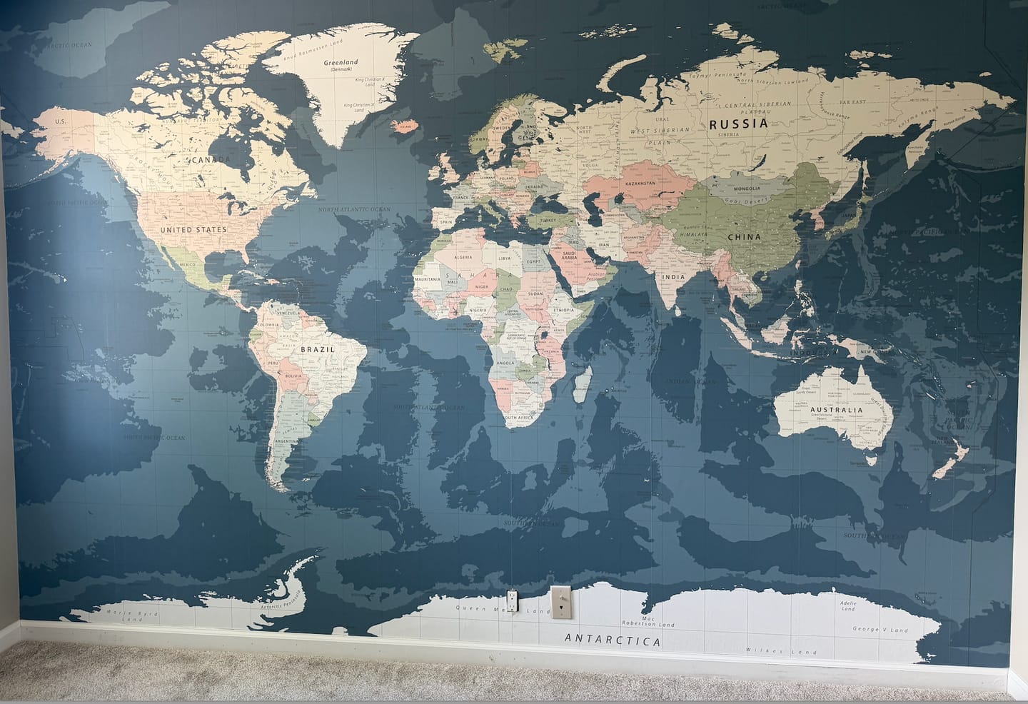Customer photo review of Blue World Map Dark - Dark Vintage World Map Wallpaper Mural