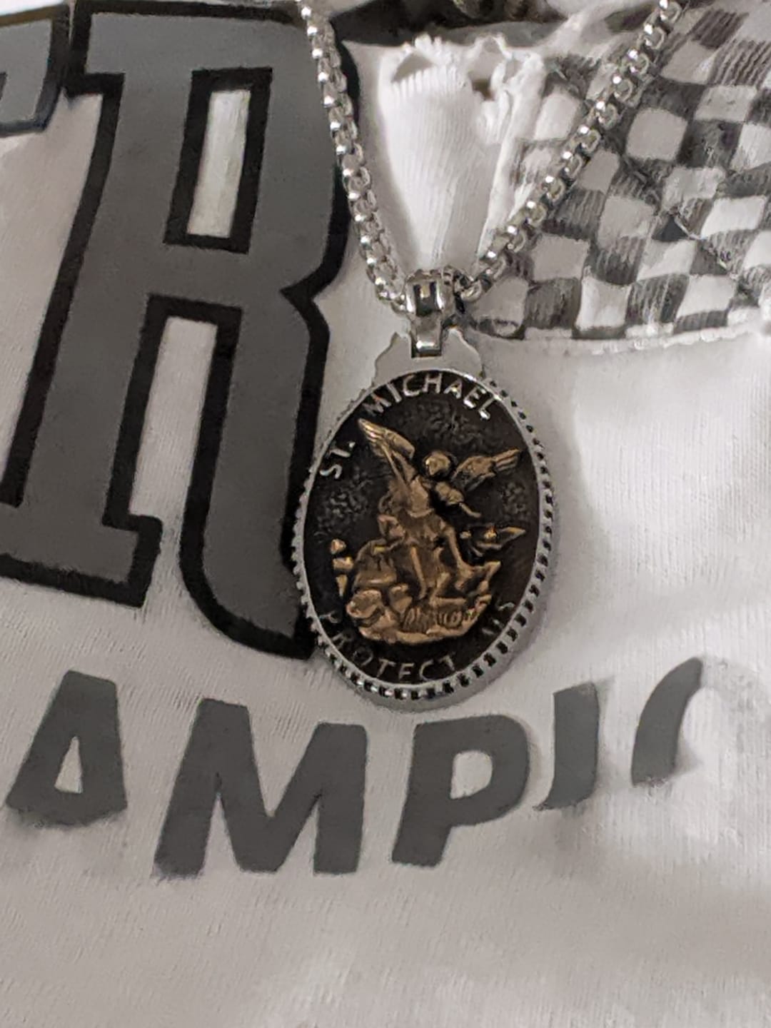 Customer photo review of ST. MICHAELS BADGE.