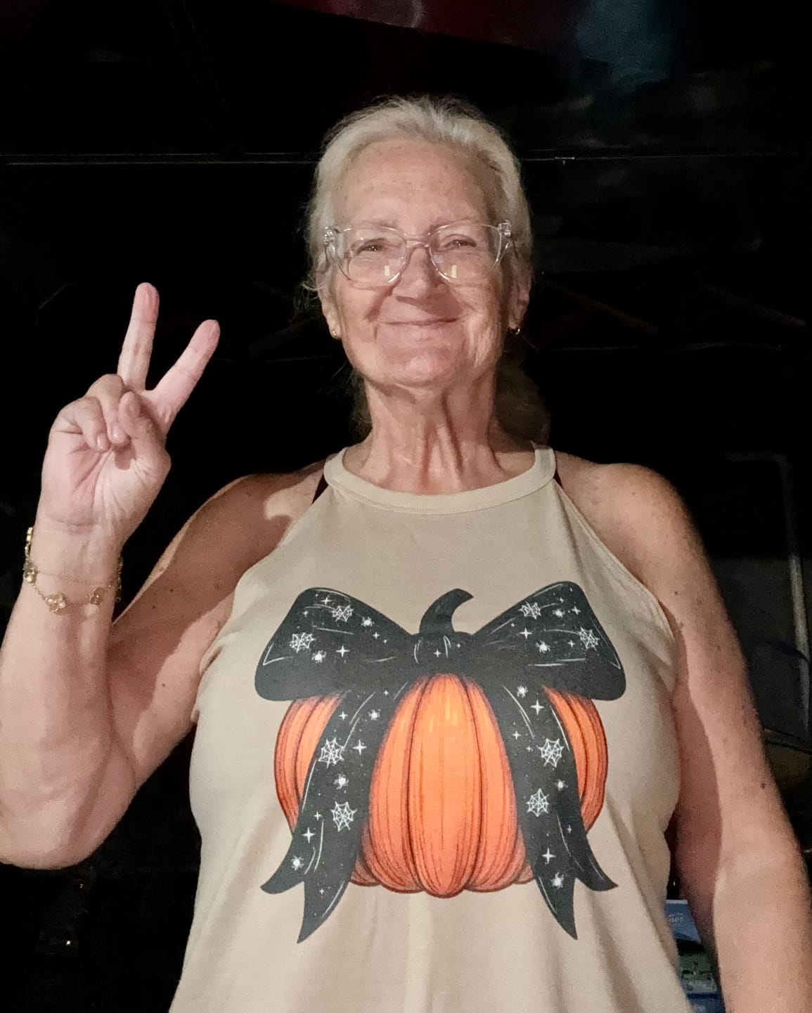 Customer photo review of Pumpkin Bow Rocker Tank