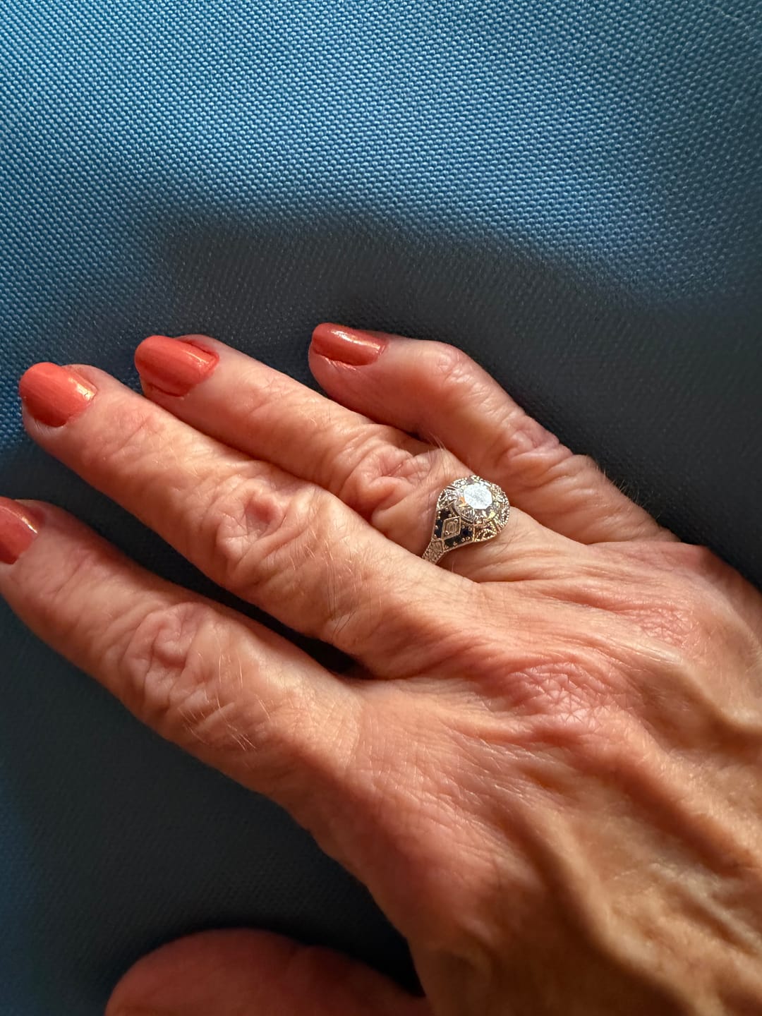 Customer photo review of Art Deco Gallery Vintage Moissanite Milgrain & Blue Accent Engagement Ring