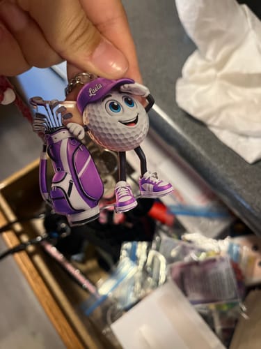 Customer photo review of Gazing Far Ahead Golf Buddy Keychain - Personalized Cute Golf Ball Mascot Keychain