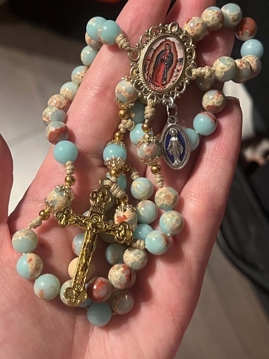 Customer photo review of Christianartworkshop Aqua Stone Prayer Rosary with Gold Accents: A Divine Source of Peace and Devotion