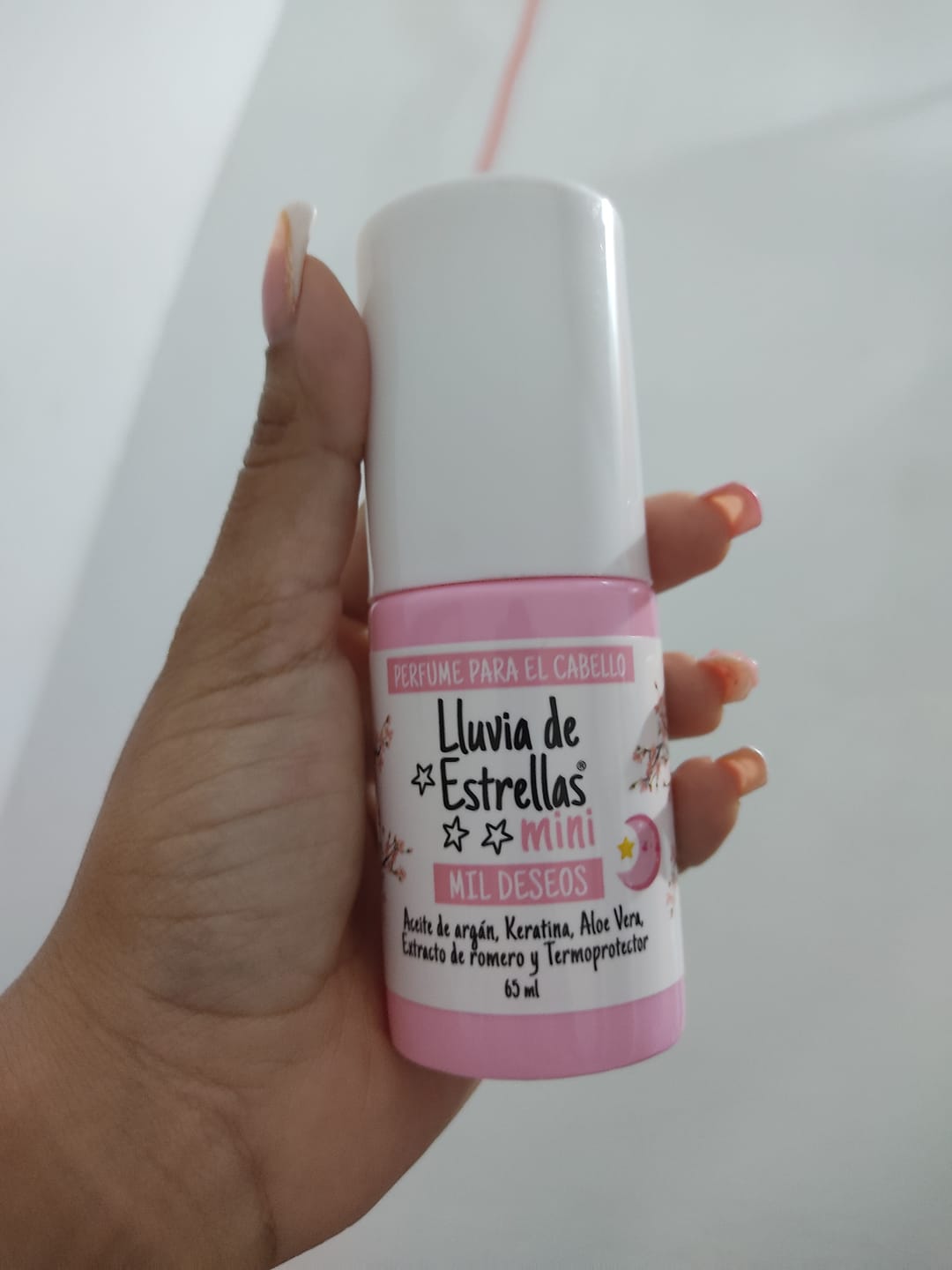Customer photo review of PERFUME PARA CABELLO MINI MIL DESEOS