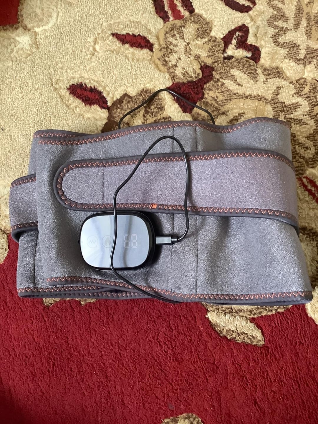Customer photo review of Ceinture Lombaire Chauffante & Massante Rechargeable
