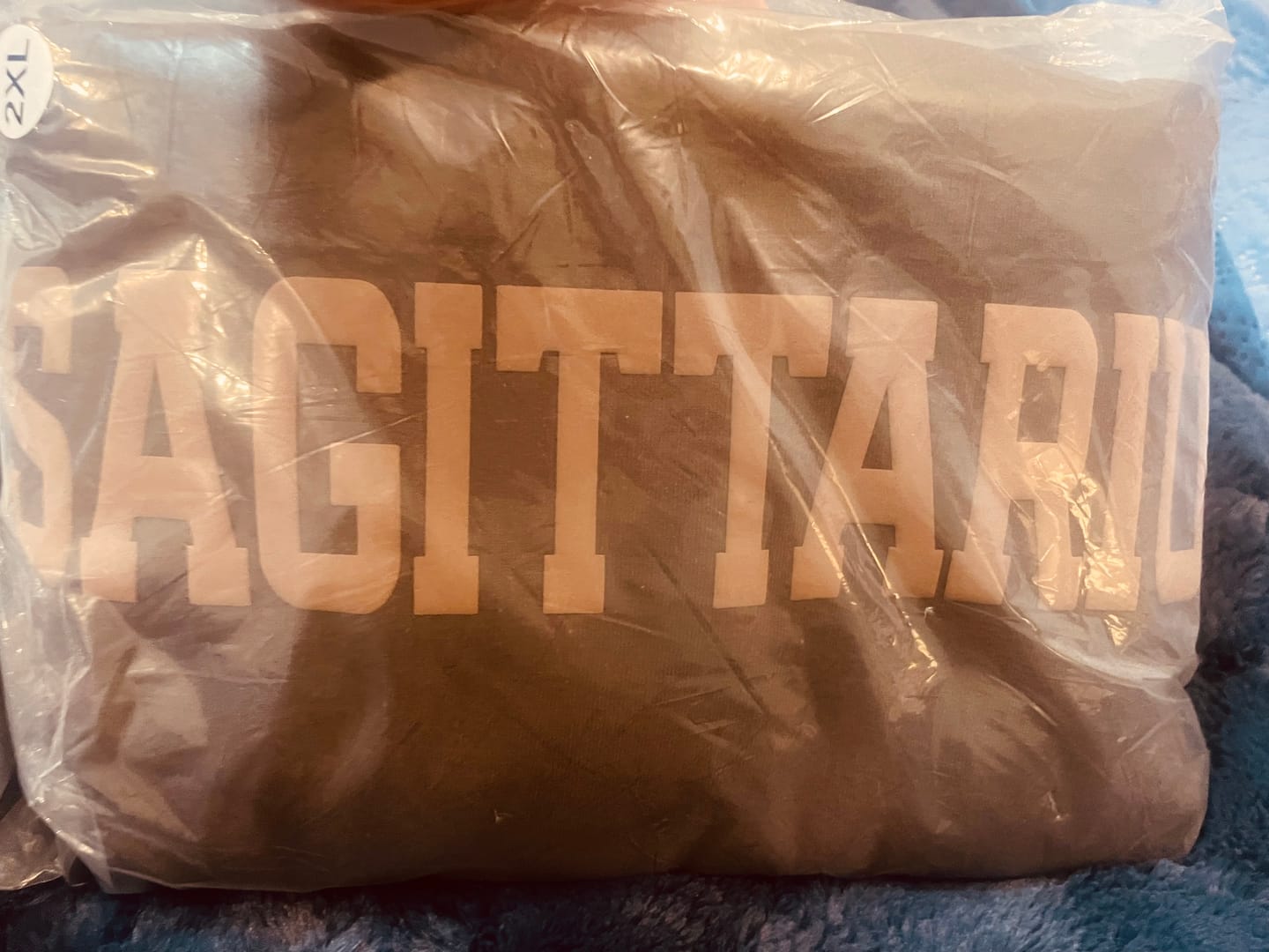 Customer photo review of Chocolate Zodiac Puff Print Crewneck