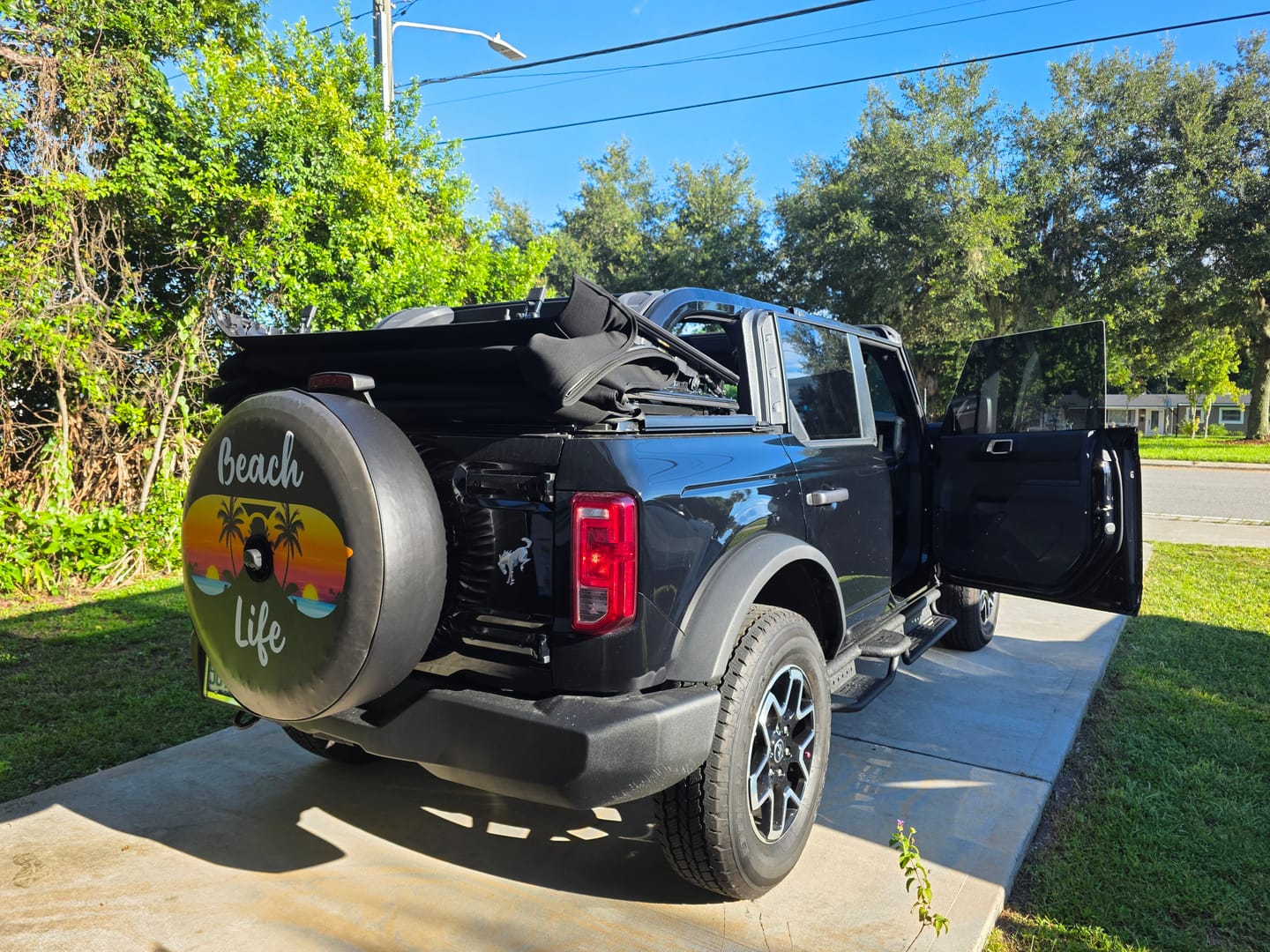 Customer photo review of Beach Life Sunglasses Sunset Tropical Spare Tire Cover for Jeep, Bronco, RV & More