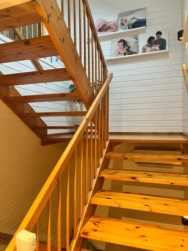 Customer's wooden staircase with natural finish before renovation with Santana Eik Kalk kontaktplast.