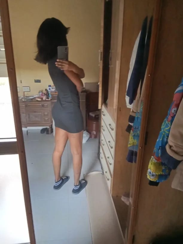 Customer photo review of Robe Camille – Mini robe moulante froncée à col montant