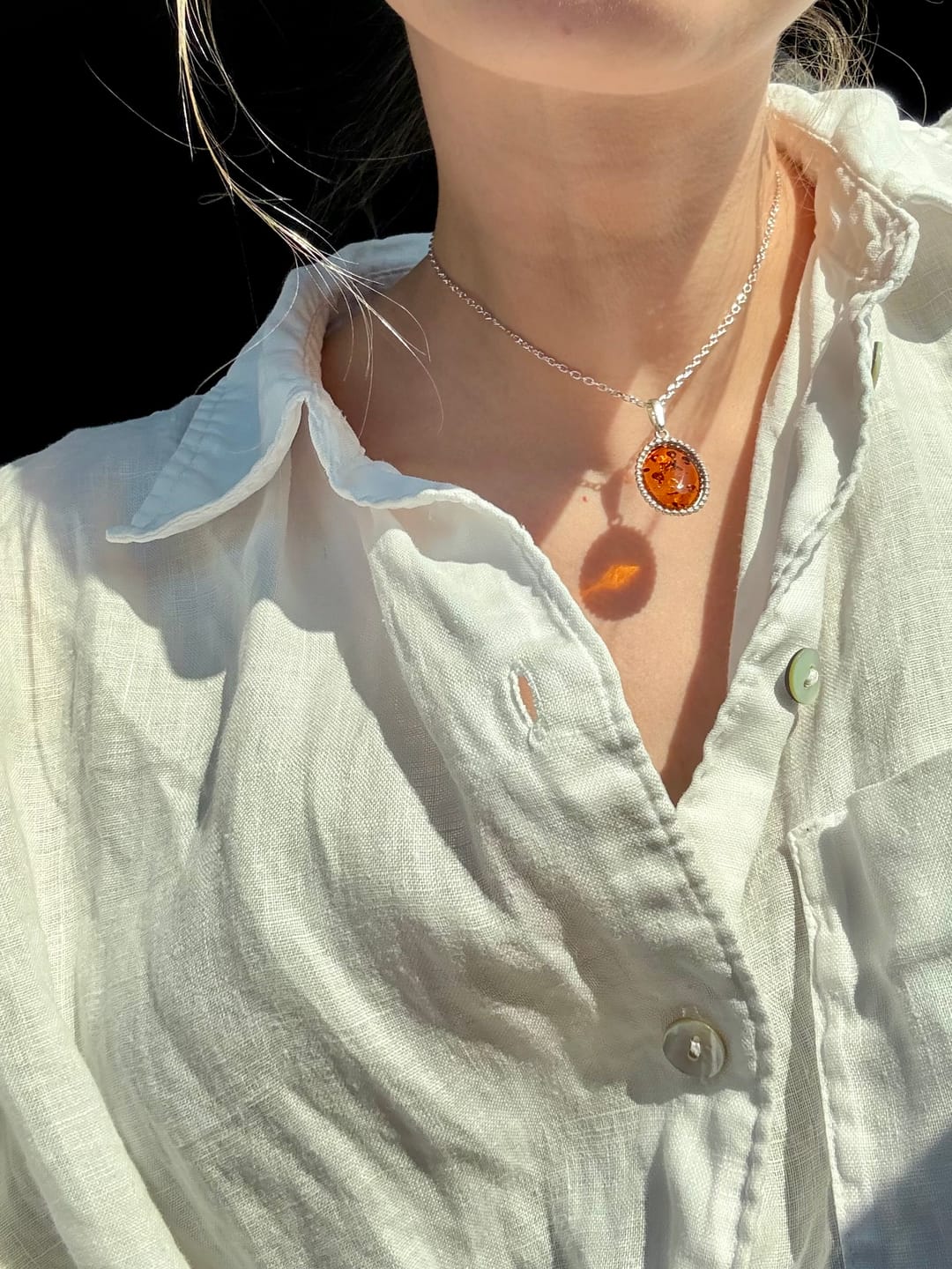 Customer photo review of Classic Quintessence Amber Pendant