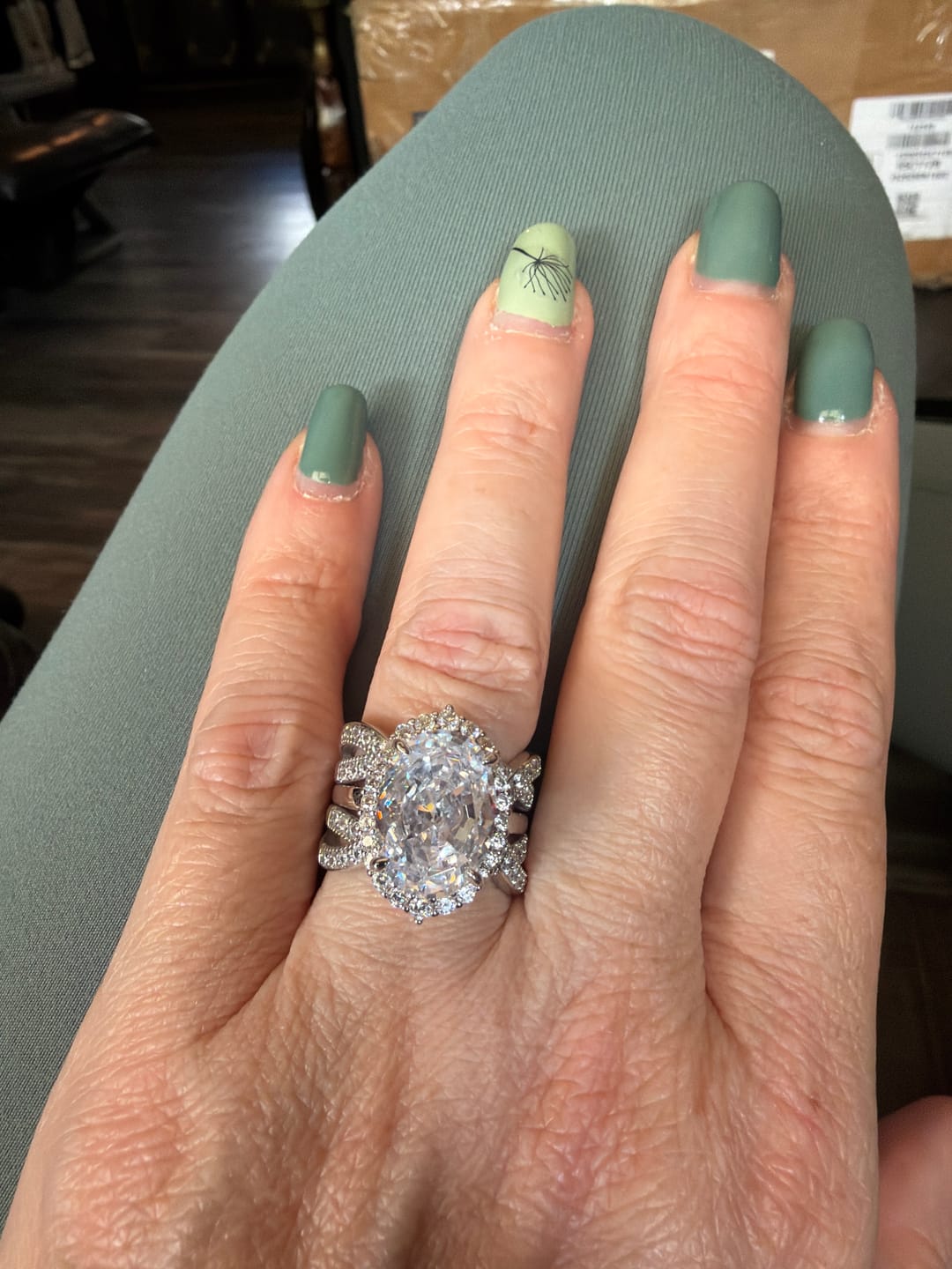 Customer photo review of Breathtaking Three-Stone Pave Oval Cut 10.0ct Engagement Ring