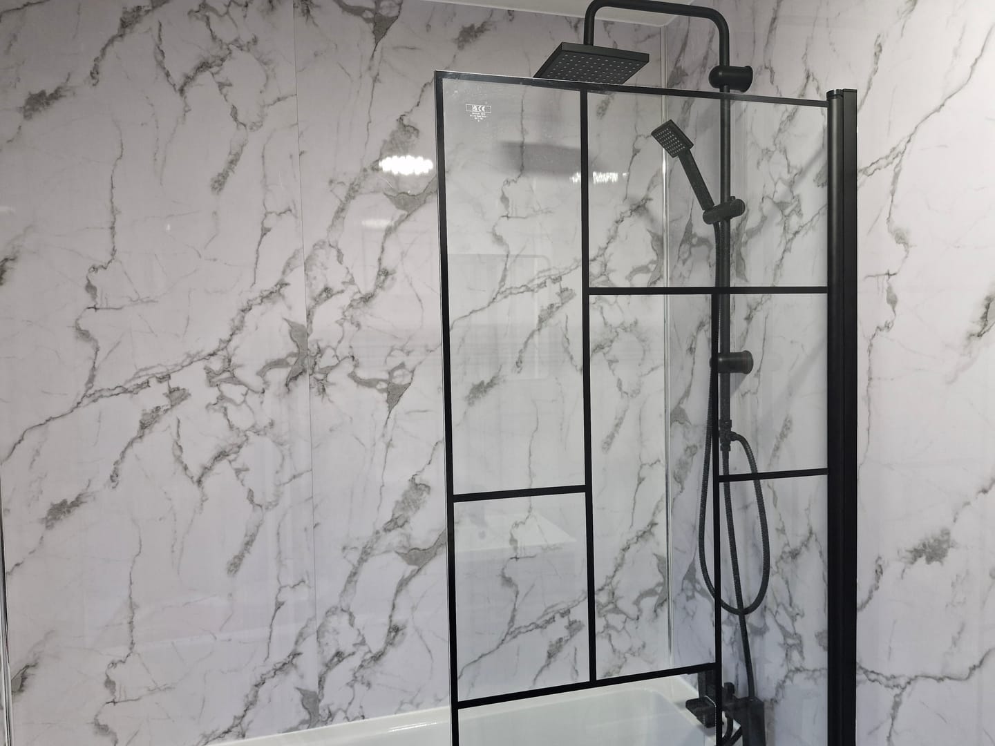 Customer photo review of Premium White Calacatta Gloss Shower Wall Panel – 1M x 2.4M