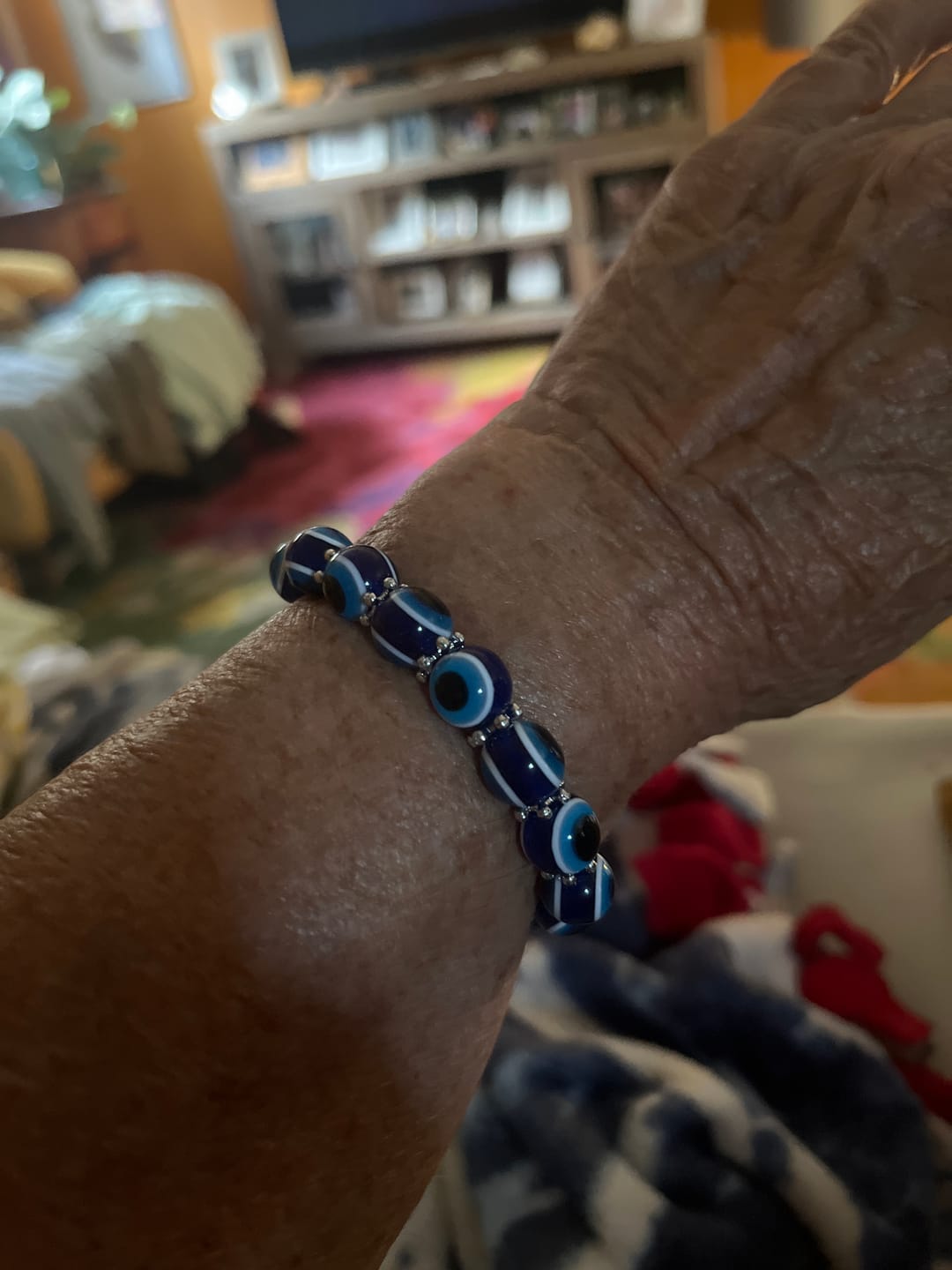 Customer photo review of Blue Hamsa Hand Evil Eye Bracelet