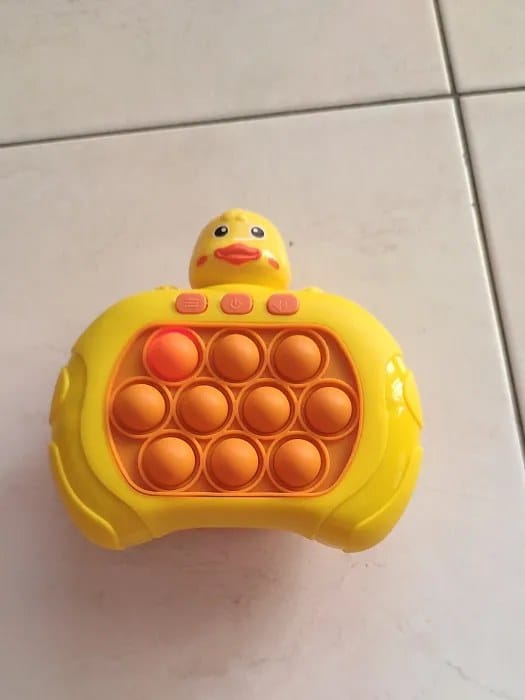 Customer photo review of Pop It Reaktionsspiel Handkonsole | Geschicklichkeitsspiel Kinder Reflextraining Tiermotiv