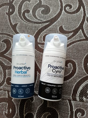 Customer's Proactive Shilajit Cyro+ and Proactive Herbal+ bottles sitting together on a patterned surface.