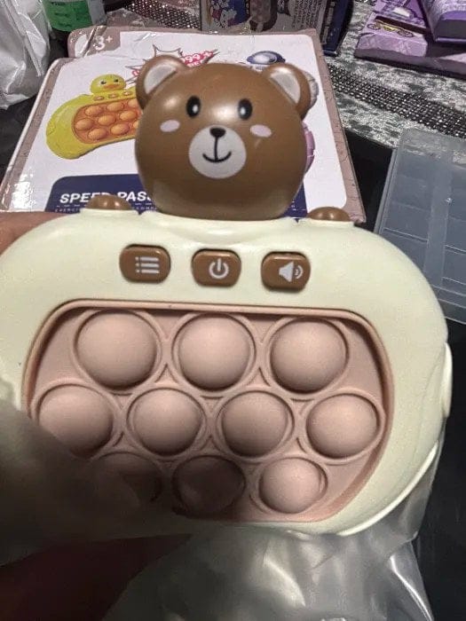 Customer photo review of Pop It Reaktionsspiel Handkonsole | Geschicklichkeitsspiel Kinder Reflextraining Tiermotiv