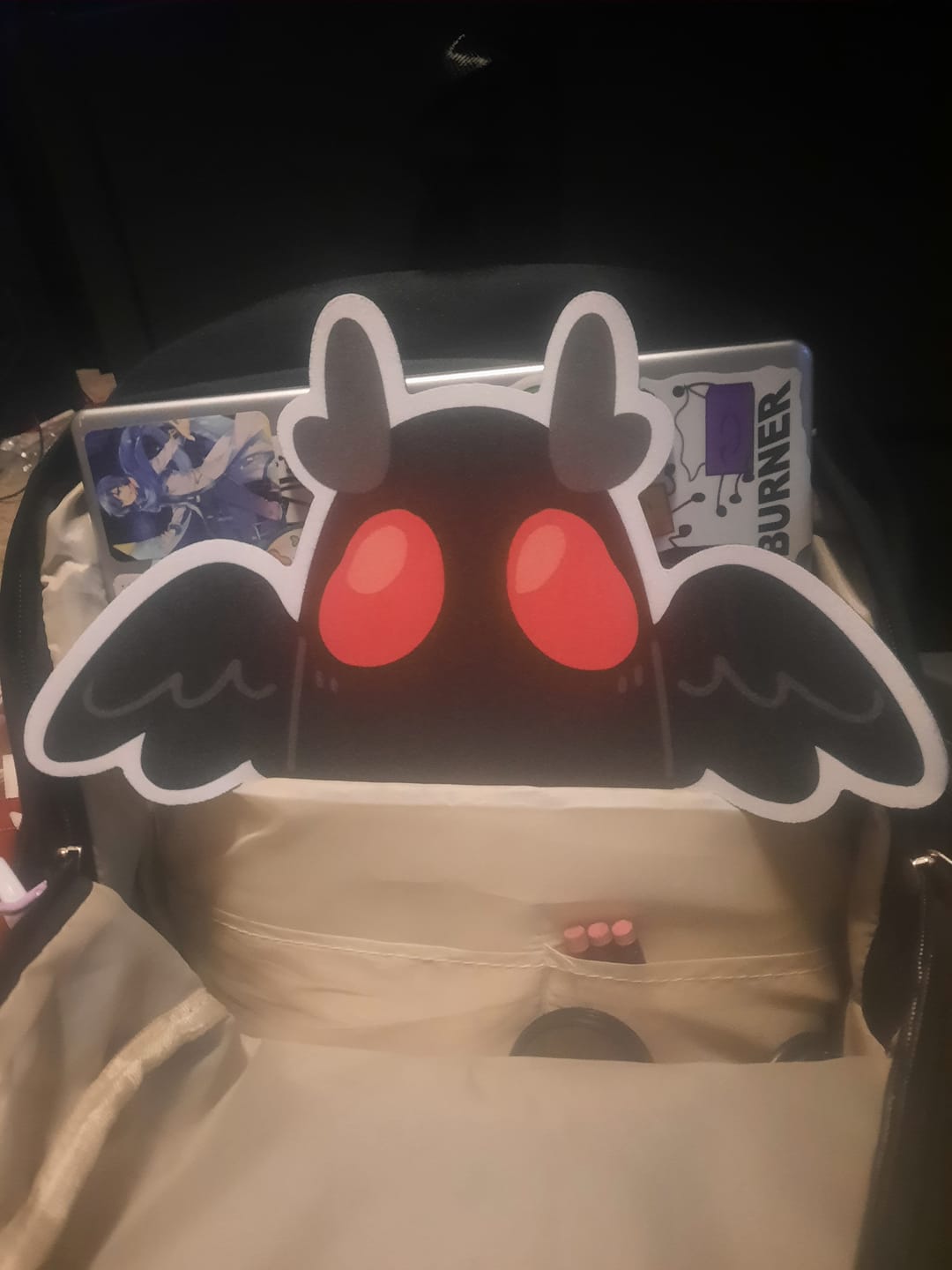 Customer photo review of Mothman Mouse Pad