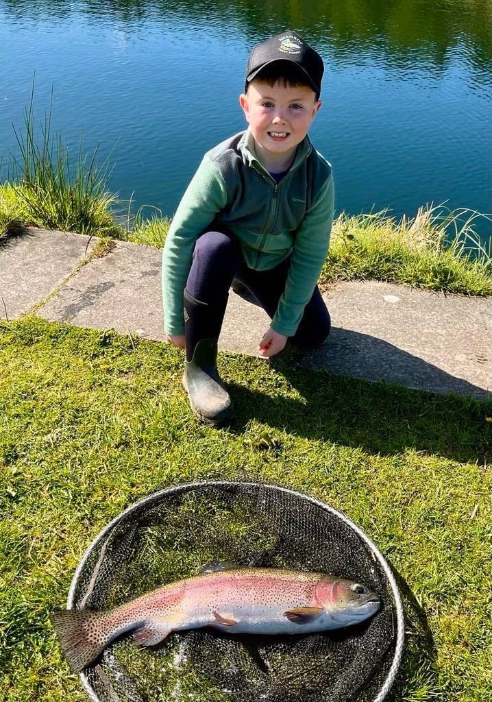 Customer photo review of Kids' Rugged II Tall Boots