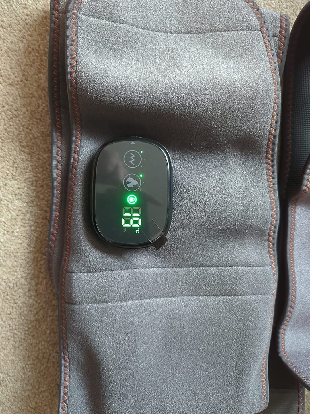 Customer photo review of Ceinture Lombaire Chauffante & Massante Rechargeable