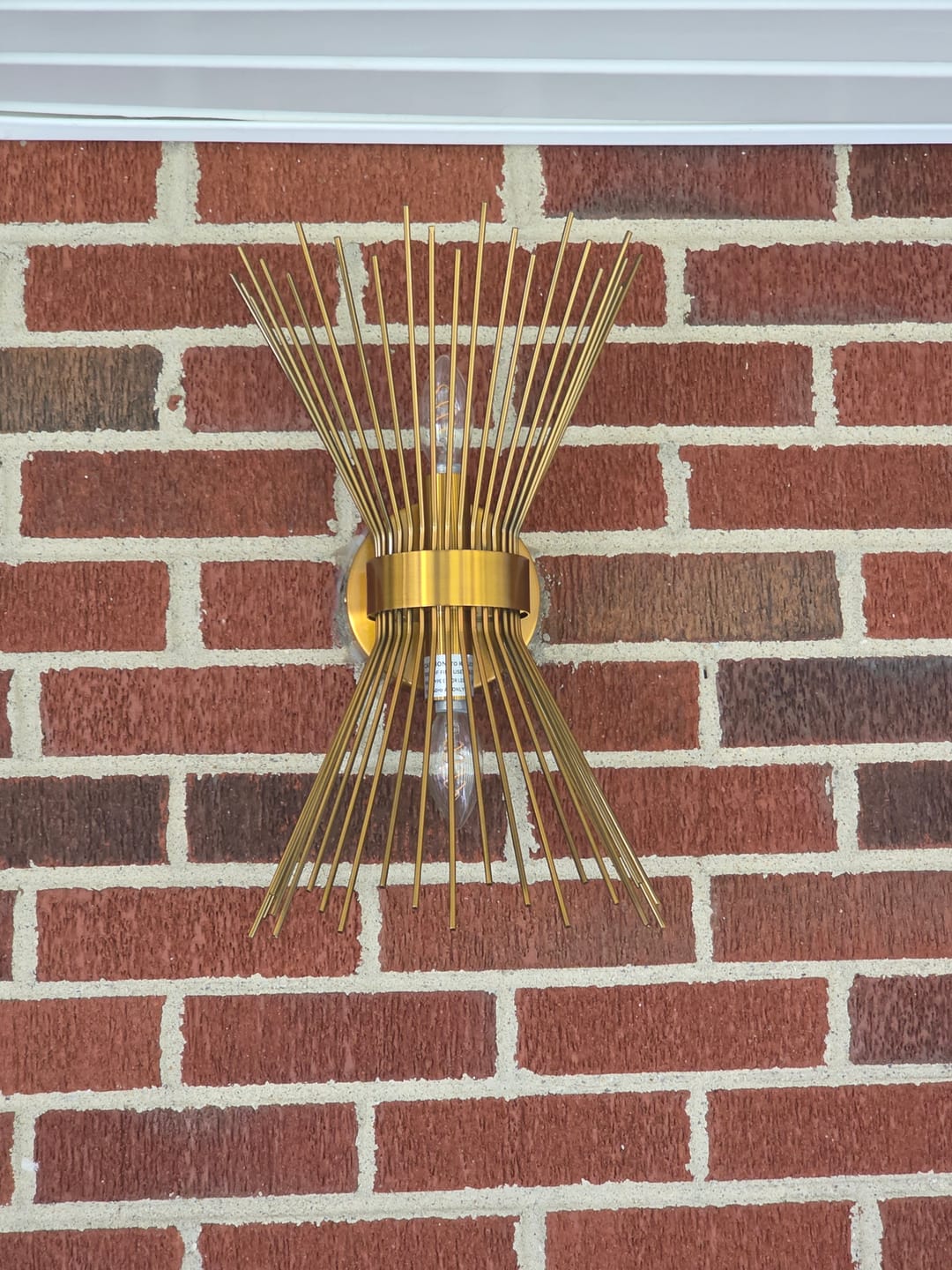 Customer photo review of Mid-Century Brass 2-Light Sunburst Hourglass Wall Sconce