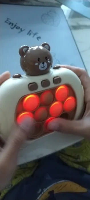 Customer photo review of Pop It Reaktionsspiel Handkonsole | Geschicklichkeitsspiel Kinder Reflextraining Tiermotiv