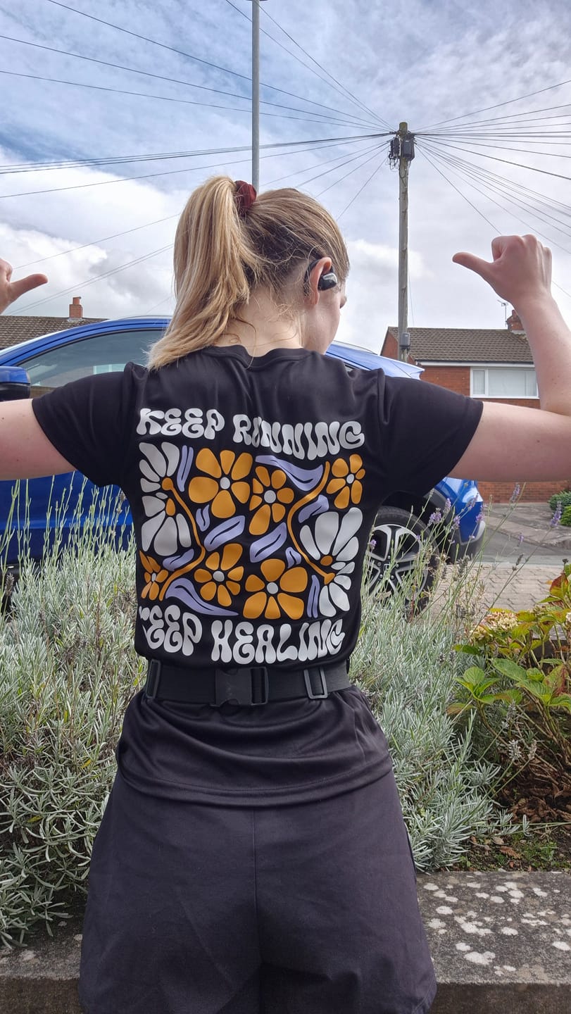 Customer photo review of Keep Running Keep Healing Women’s Activewear T-Shirt