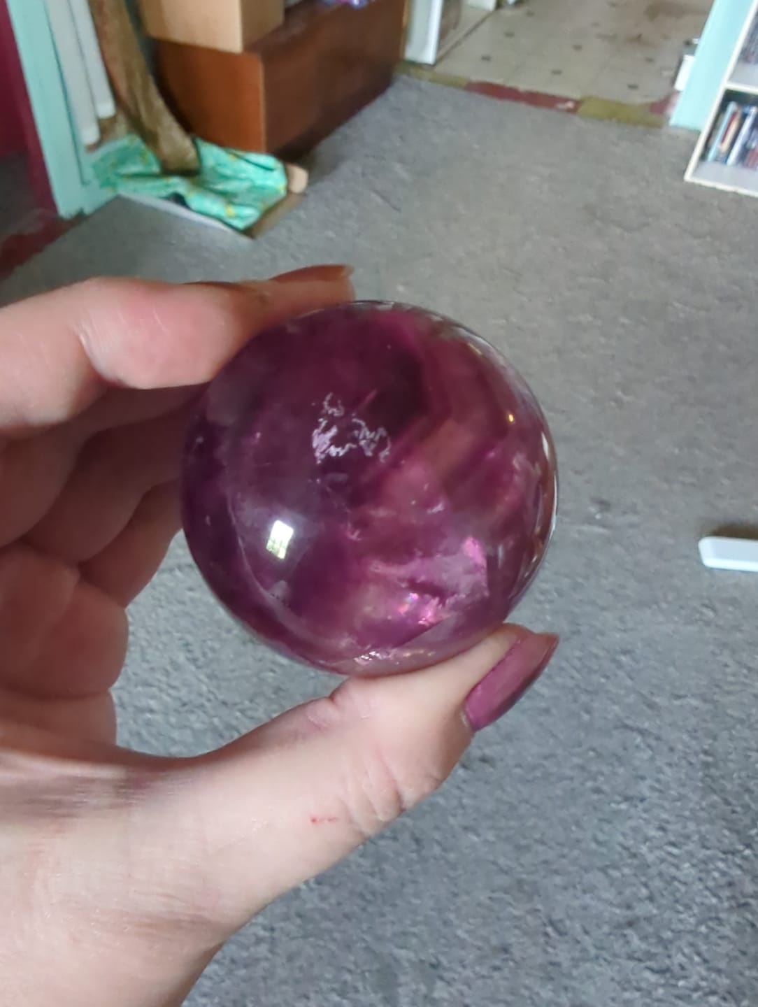 Customer photo review of Natural Crystal Vibrant Purple Fluorite Sphere