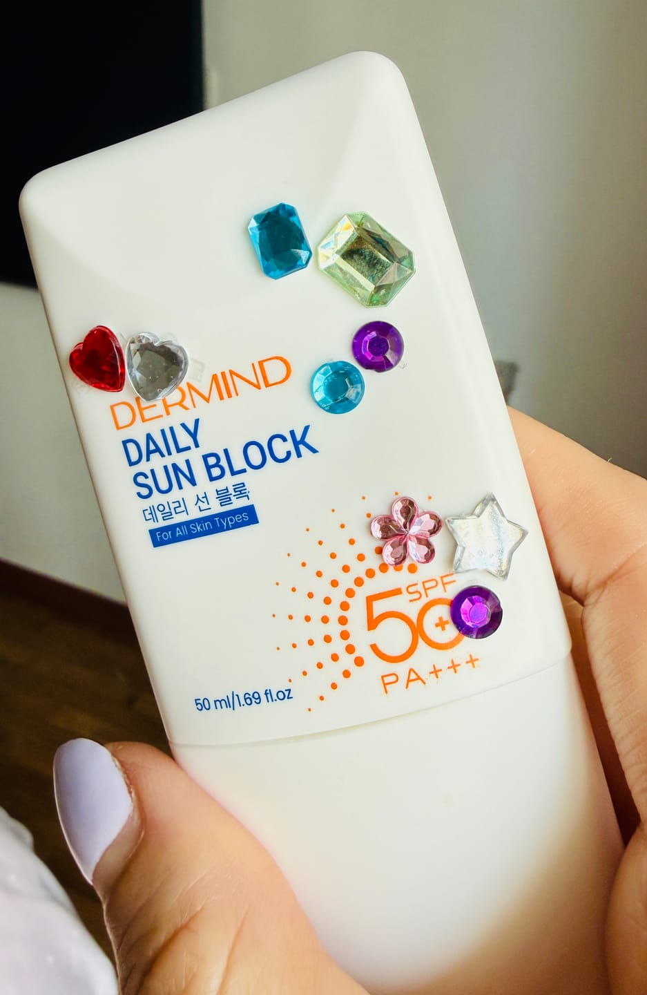 Customer photo review of Dermind Daily Sun Block SPF50+ PA+++ 50ml