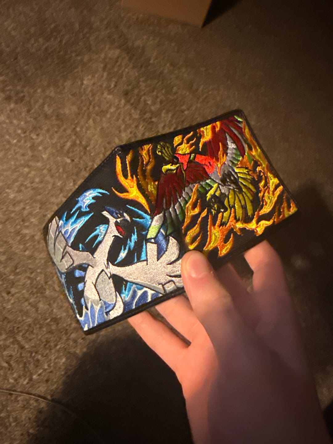 Customer photo review of Rare Birds Bi-Fold Wallet