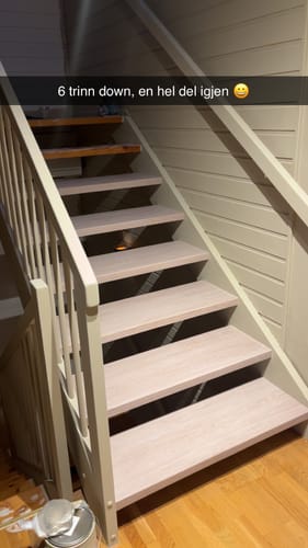 Customer's staircase during renovation with Santana Eik Kalk kontaktplast partially applied to the steps.