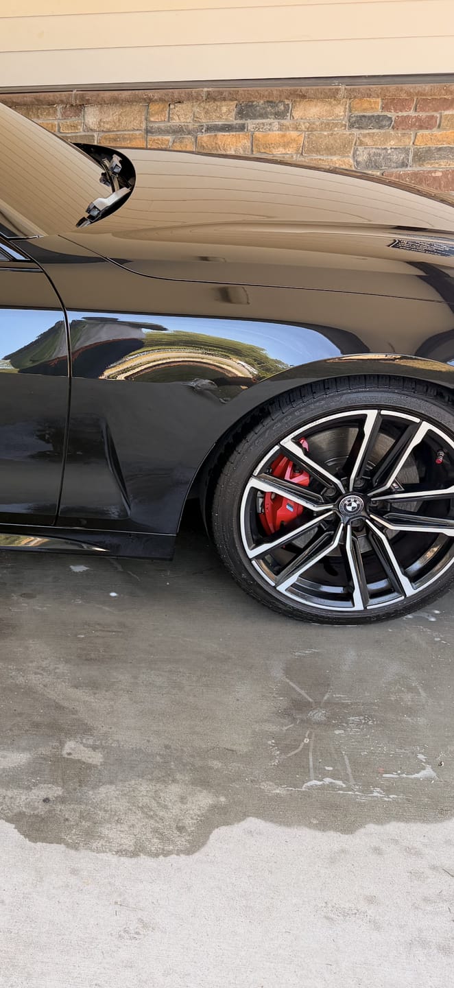 Customer photo review of BMW 50TH ANNIVERSARY WHITE BLACK FLOATING WHEEL CENTRE CAP SET