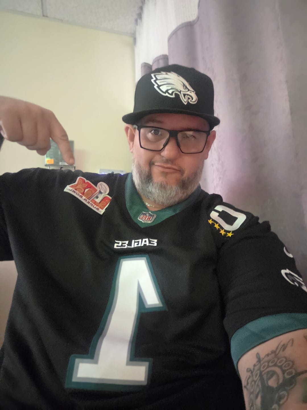 Customer photo review of Men’s Seattle “Super Bowl LX & 50th Patch” Gold Vapor Limited Jersey