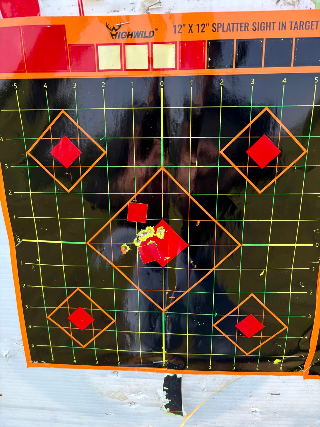 Customer photo review of Sight in Stick Splatter Adhesive Shooting Targets - Splash Effect of Multiple Colors - 12 x 12 Inch