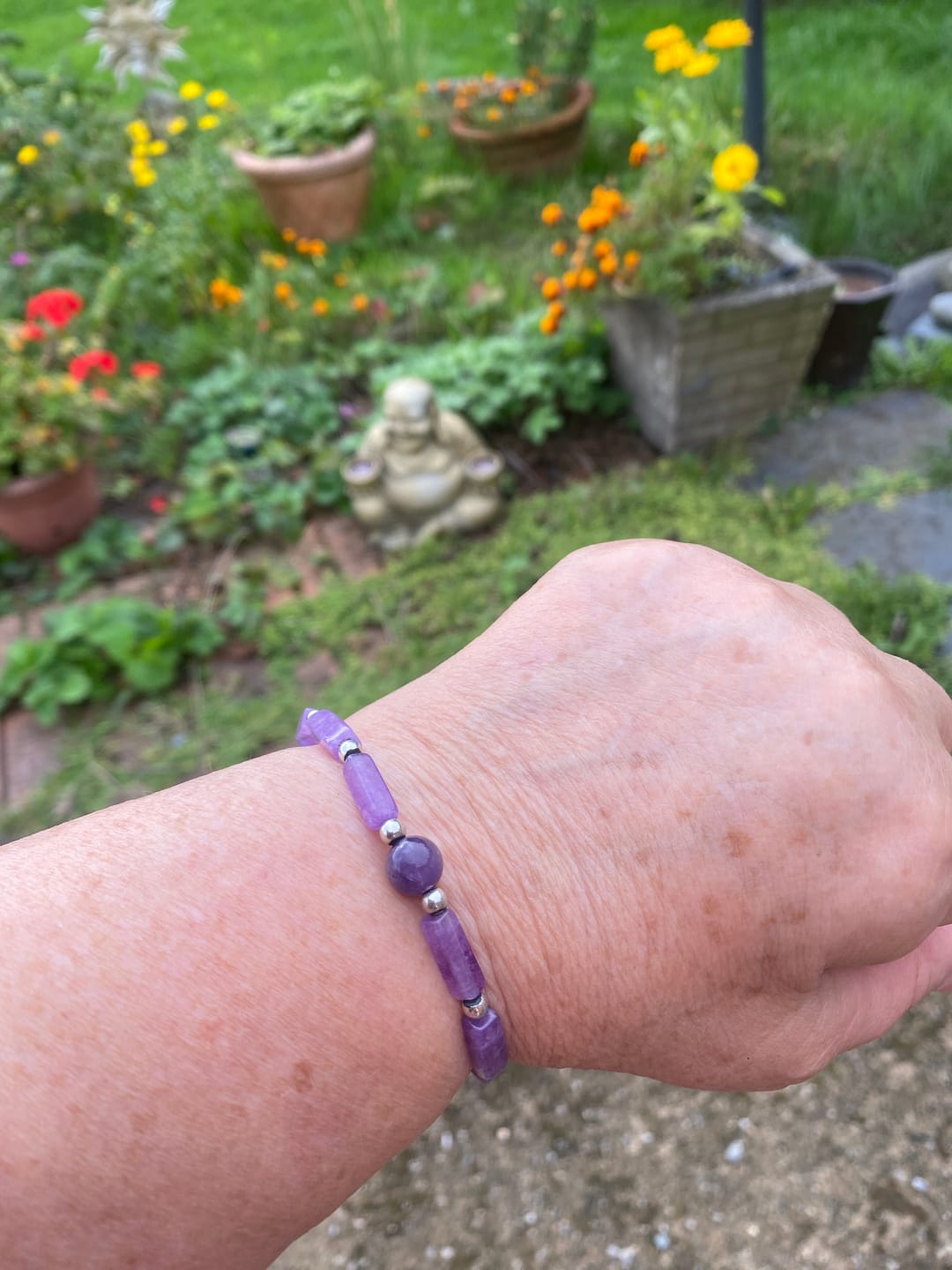 Customer photo review of Buddha Stones Natural Crystal Amethyst Tiger Eye Spiritual Balance Bracelet