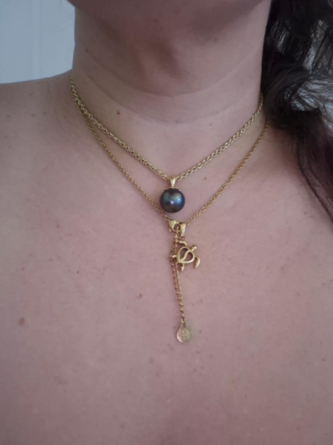 Customer photo review of Honu Turtle Necklace