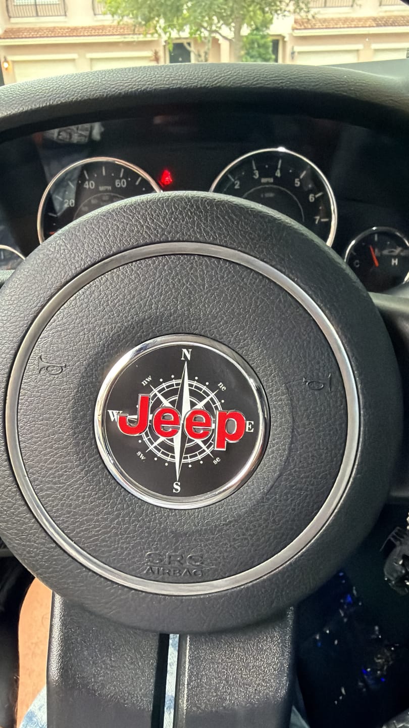 Customer photo review of JEEP Steering Wheel Emblem Overlay Decal — 30+ Colors & Designs (Flag, Topo, Animal, Solid)