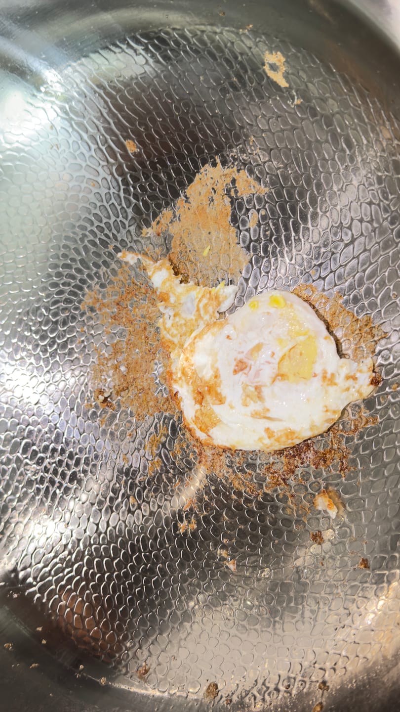 Customer photo review of Hand-Hammered Titanium Wok Pan with Flat Base