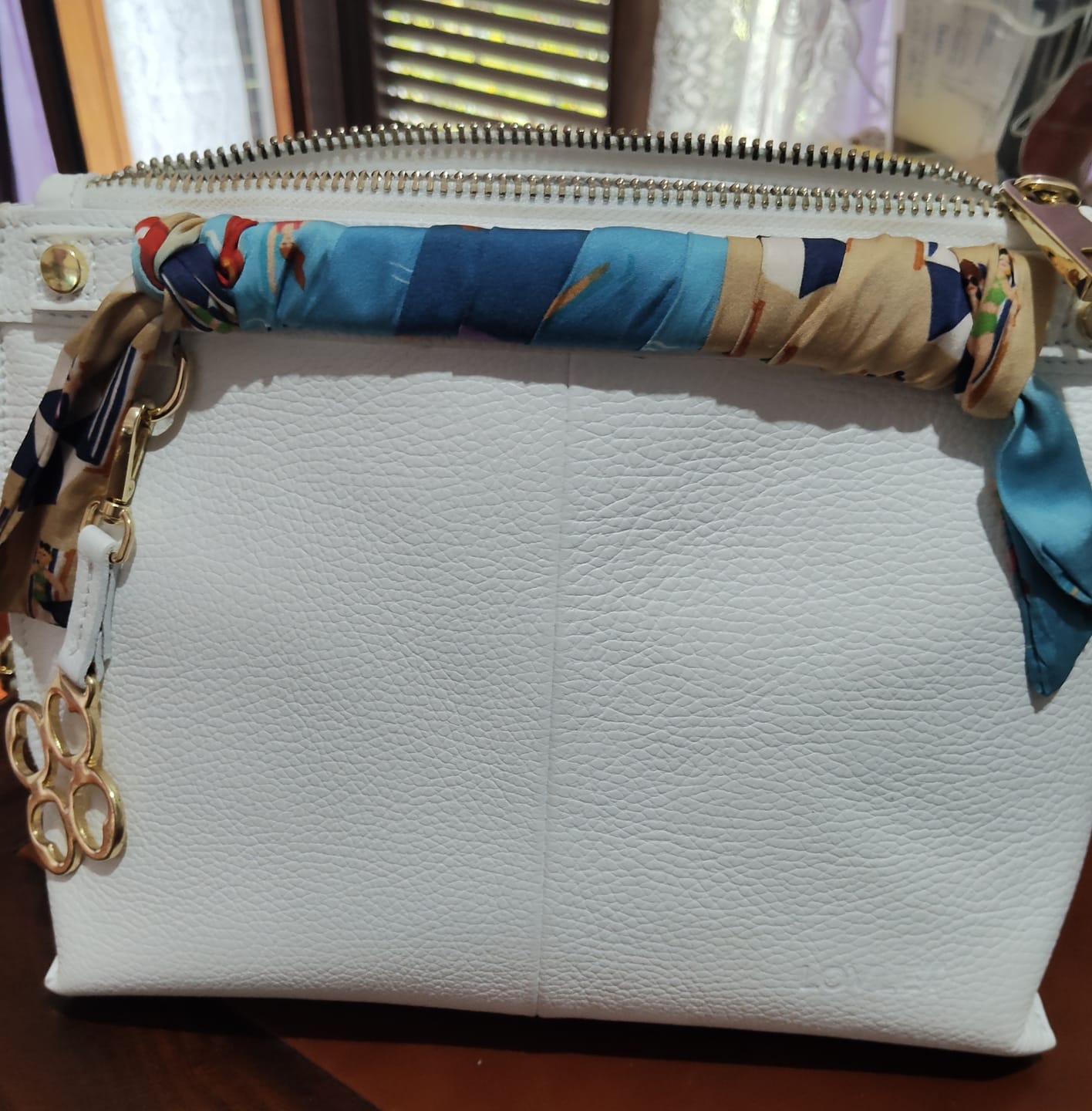 Customer photo review of BORSA MINI SOFY PELLE BIANCO