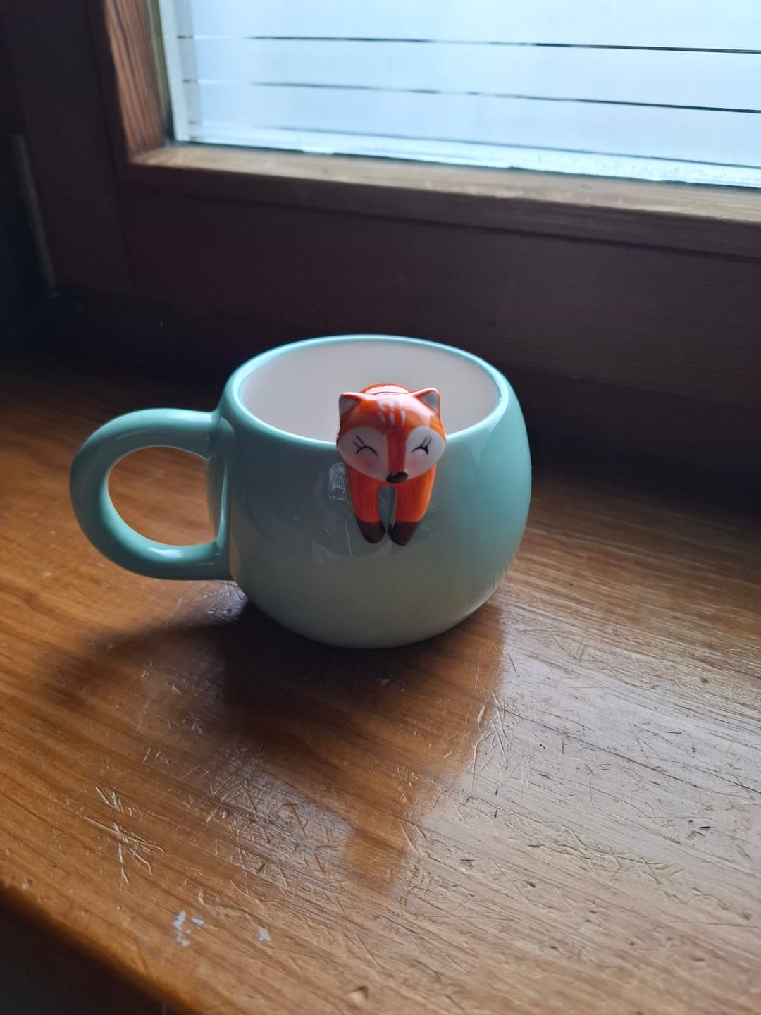 Customer photo review of Süßer Kaffeebecher mit kletterndem Fuchs