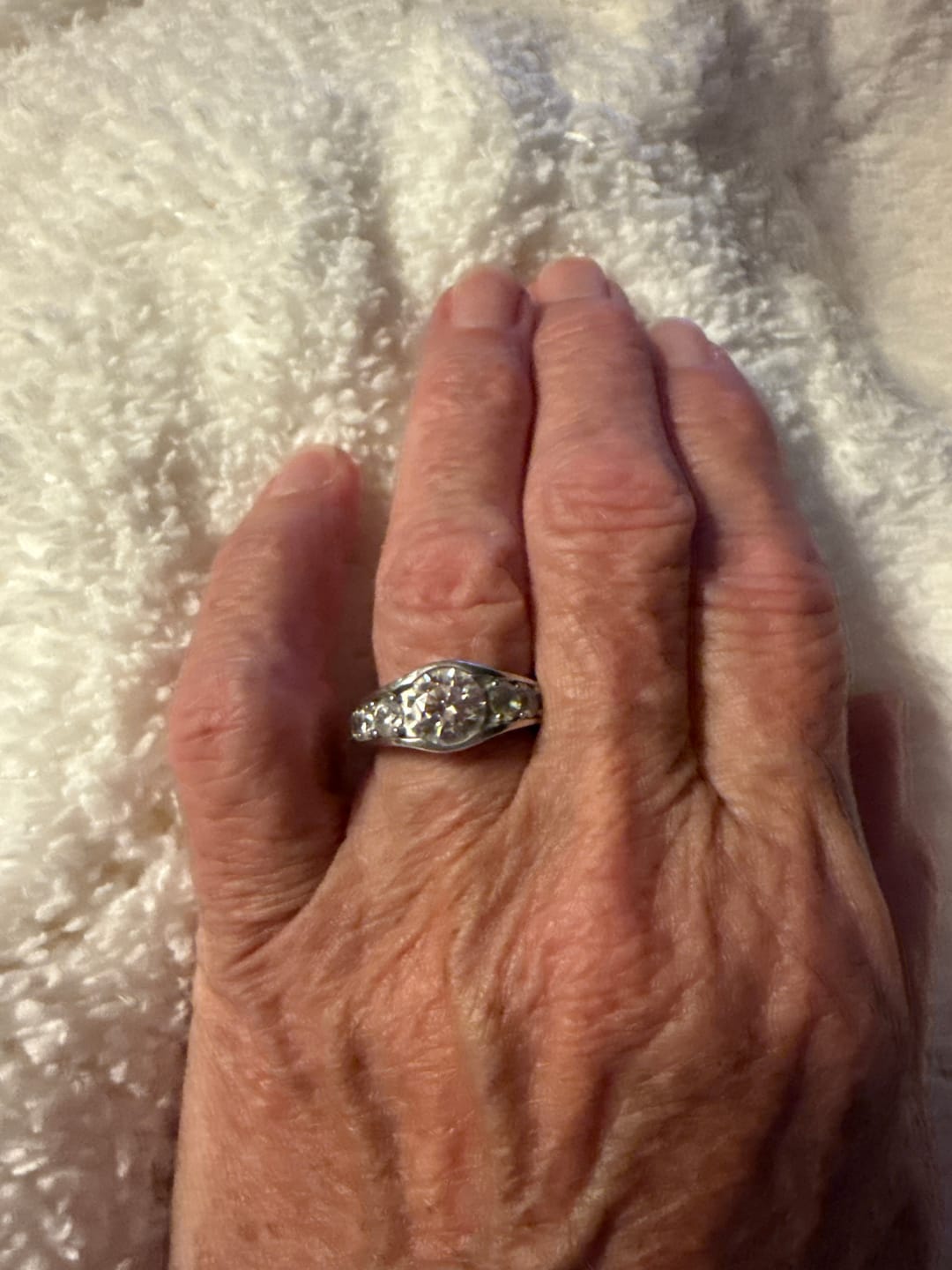 Customer photo review of Bezel Round Moissanite Channel Euro Shank Engagement Ring