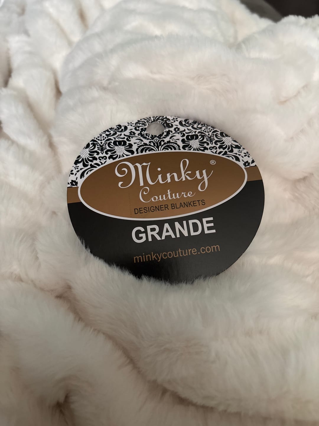 Customer photo review of Hugs Cream Blanket