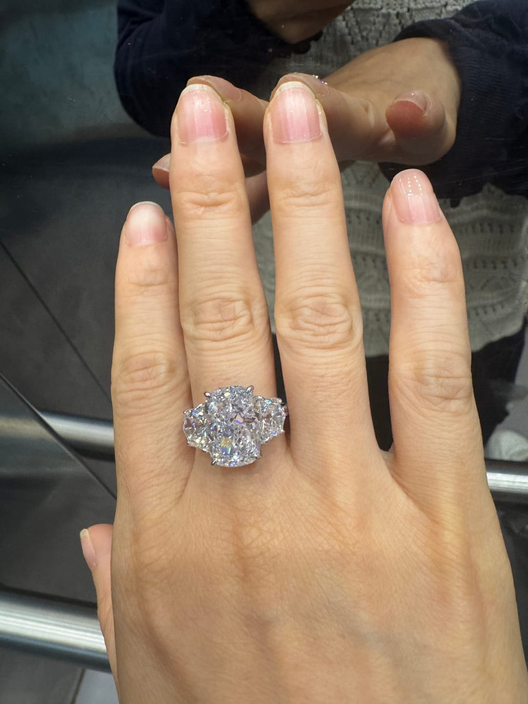 Customer photo review of 6.0 Ct Elongated Cushion Cut Simulated Diamond Three-Stone Travel Engagement Ring in S925 Sterling Silver