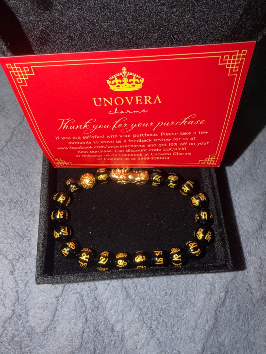 Customer photo review of 10mm Black Onyx Mantra with 24 Karat Gold Lucky PiYao and for Money Catcher and Good Fortune
